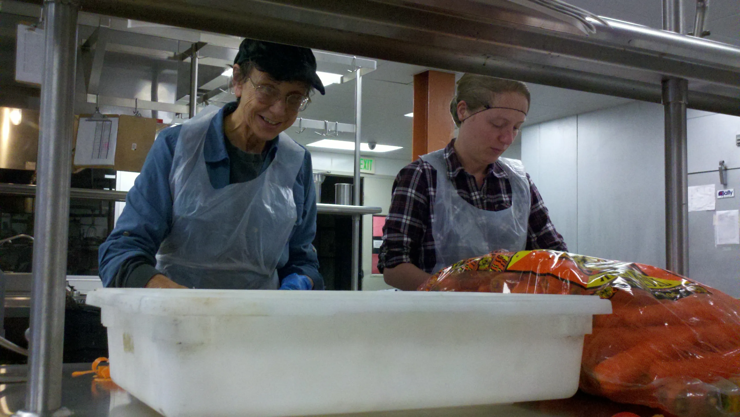 Joan Hellman, NWSB chorus member, volunteering at Moveable Feast